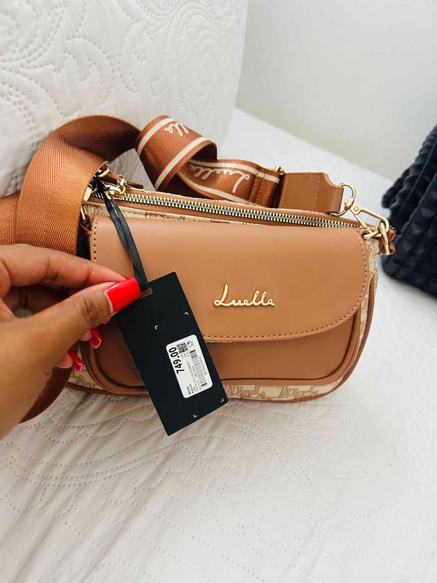 Luella cross bag comes with a mini bag