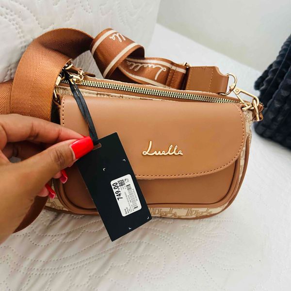 Luella cross bag comes with a mini bag