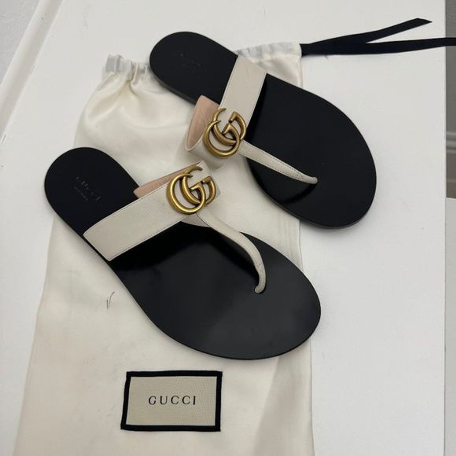 White gucci thong on sale sandals