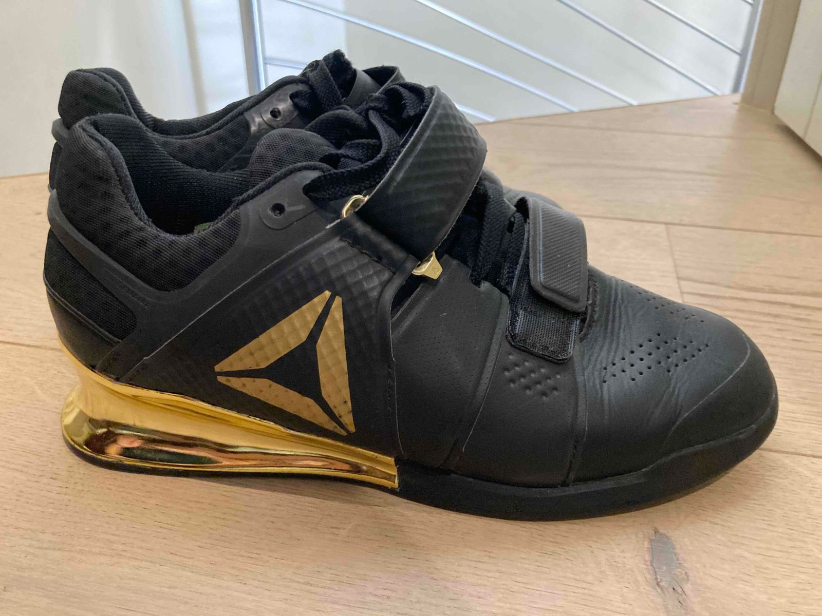 Reebok legacy lifter on sale black and gold