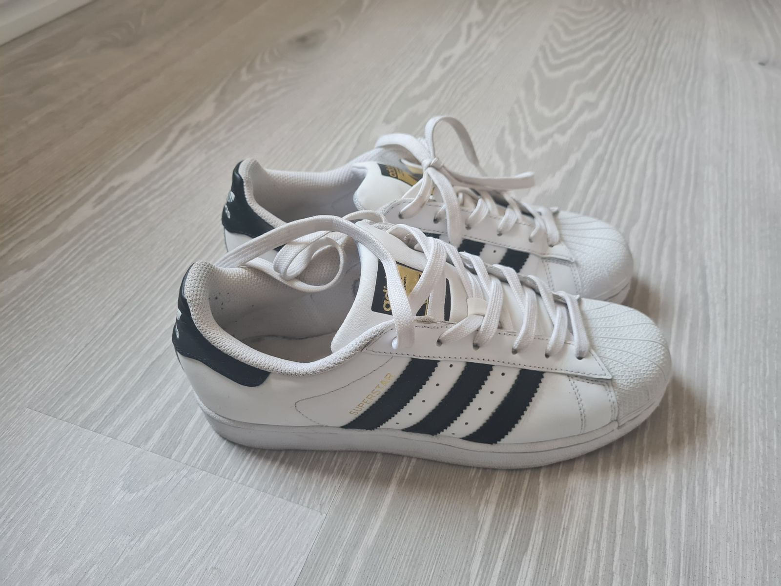 Adidas superstar black and white olx hotsell