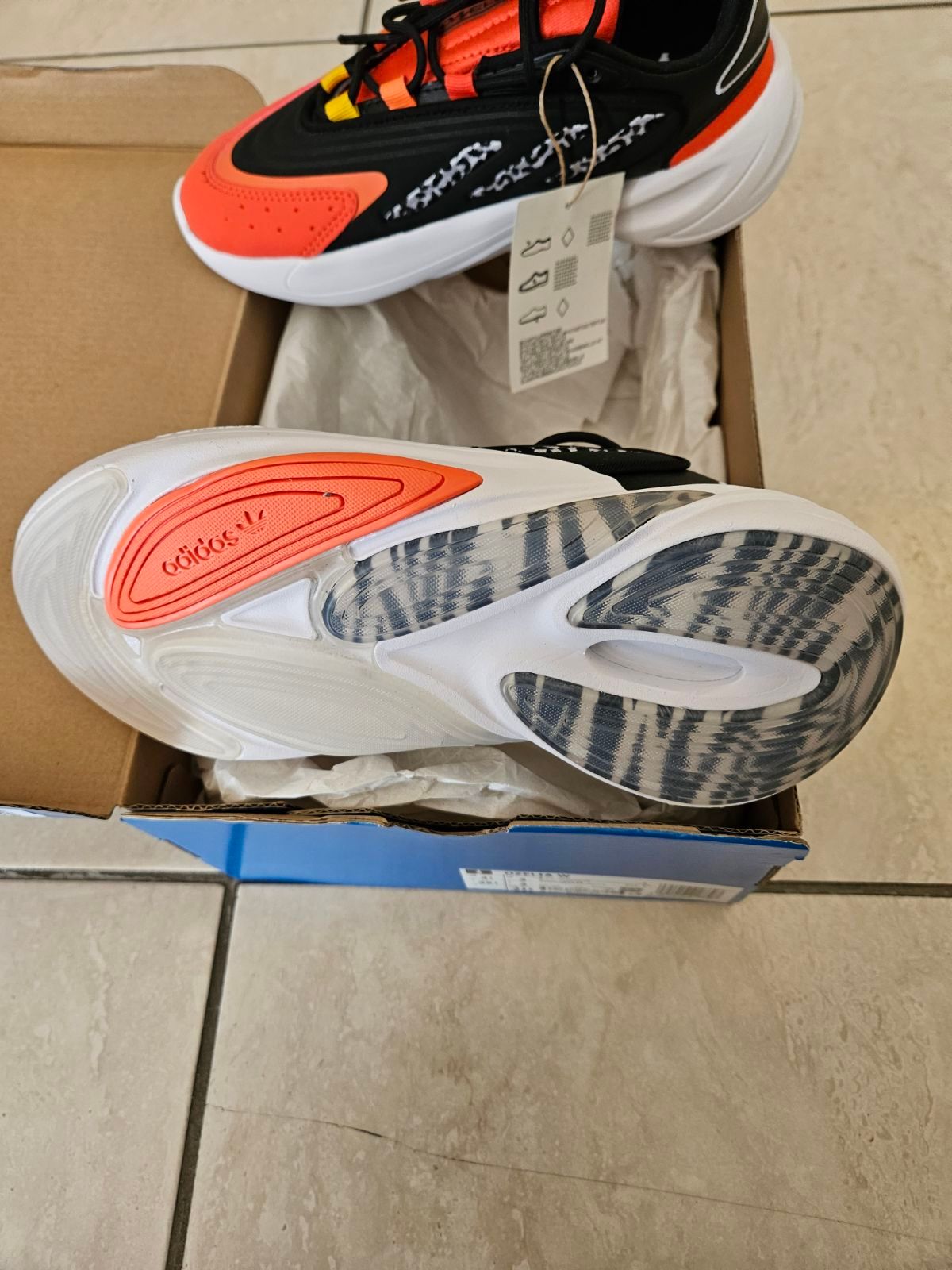 Women | Adidas Ozelia orange and black size 4 n | YAGA
