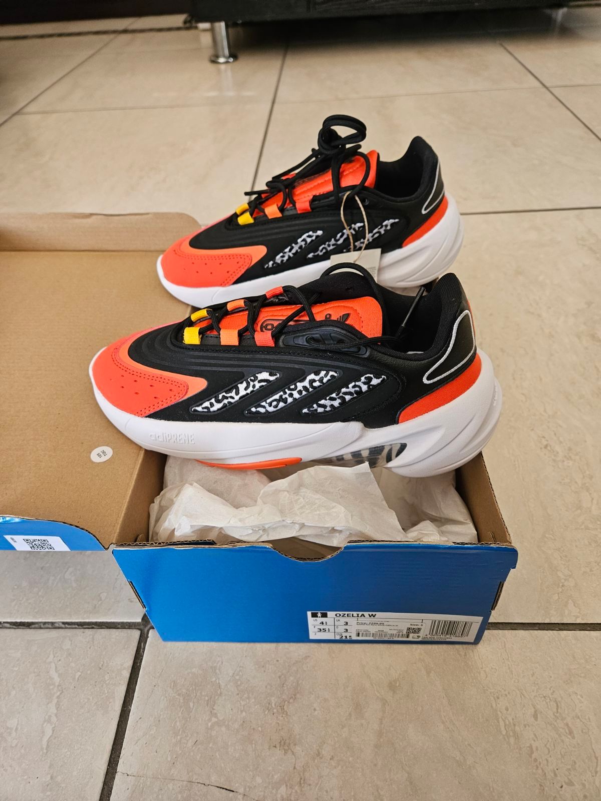 Women | Adidas Ozelia orange and black size 4 n | YAGA