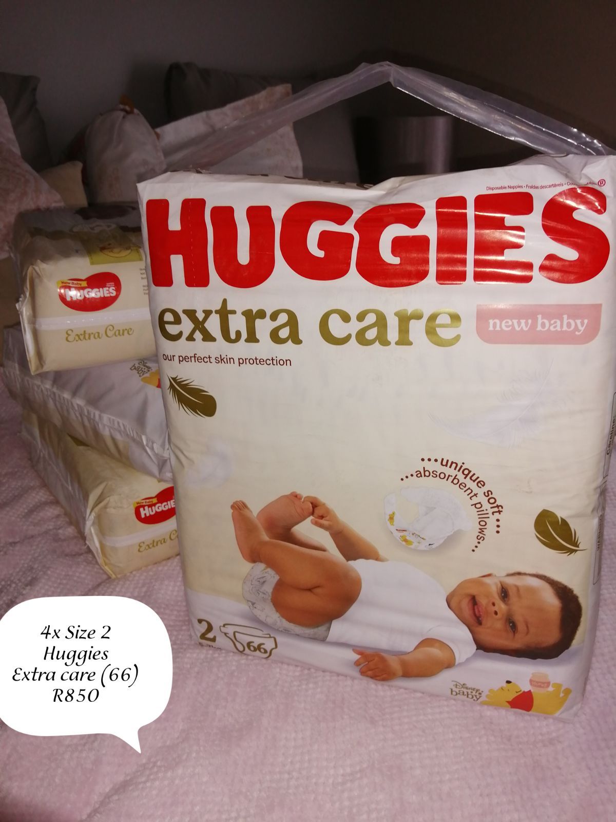 Kids Huggies extra care size 2, new 66 in b YAGA