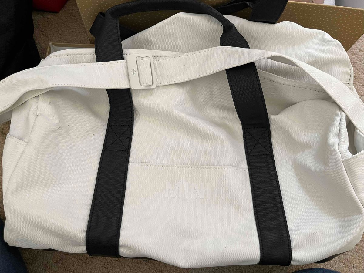 Mini Cooper Duffle bag Original bought with car Color white and black Straps included