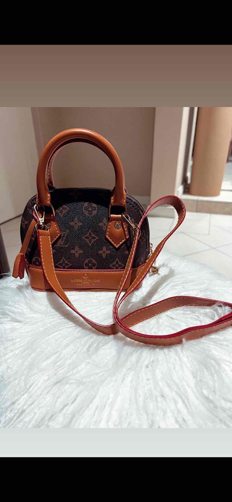 Louis Vuitton Alma bag. Brand new. Has the cutest little gold lock attached to it. Comes with a s