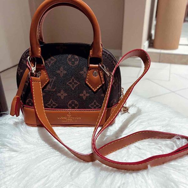 Louis Vuitton Alma bag. Brand new. Has the cutest little gold lock attached to it. Comes with a s