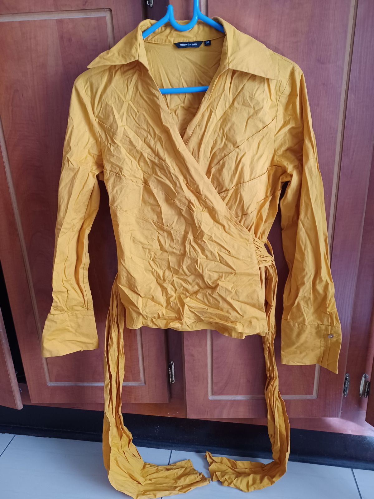 Yellow tops cheap at truworths