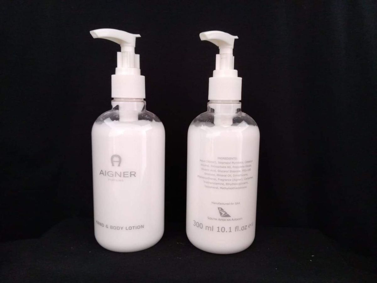 Aigner Hand and Body Lotion 300ml each NEW ITEM Product has small SAA emblem on back of bottle