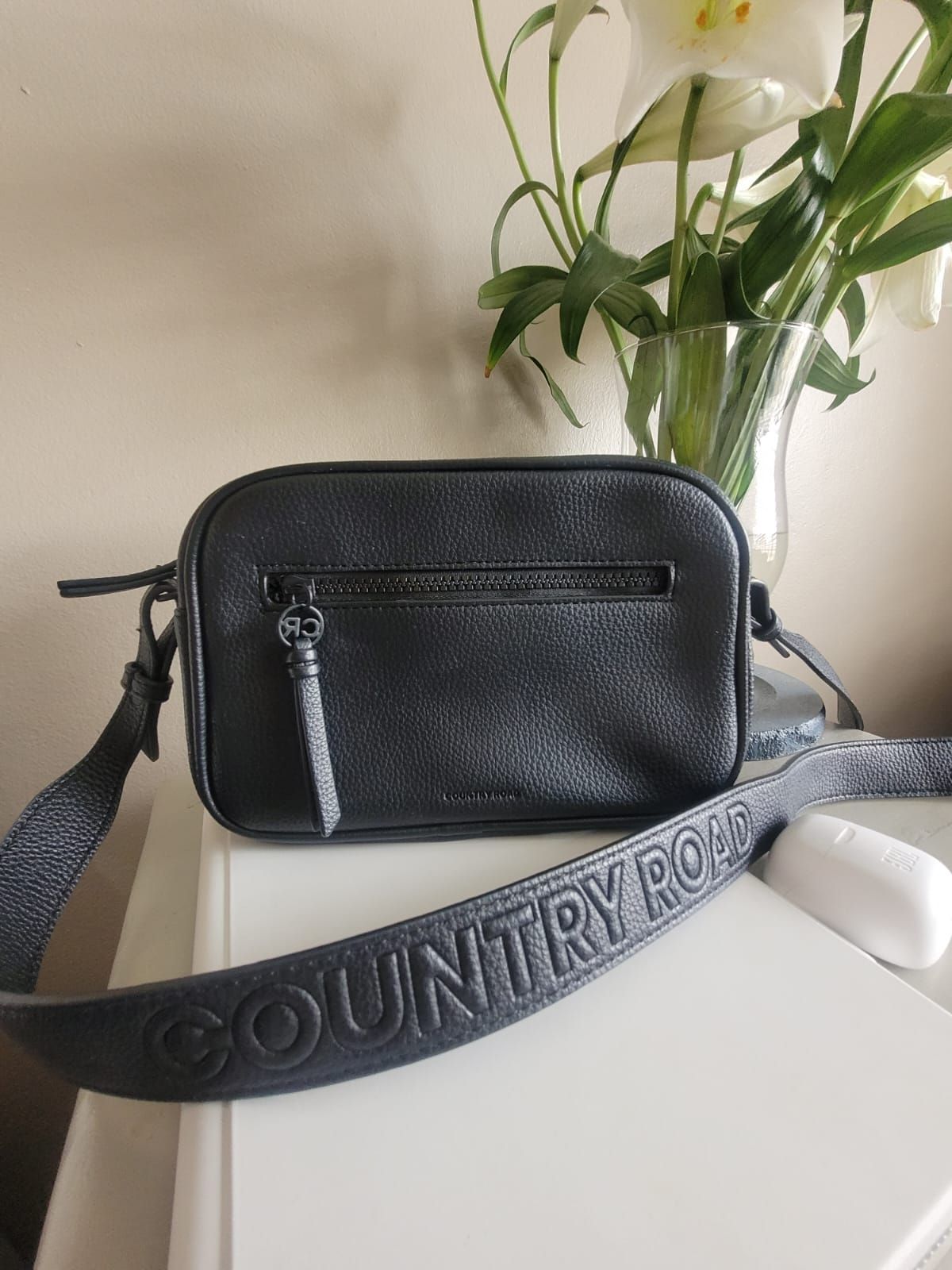 Black country road cross body bag