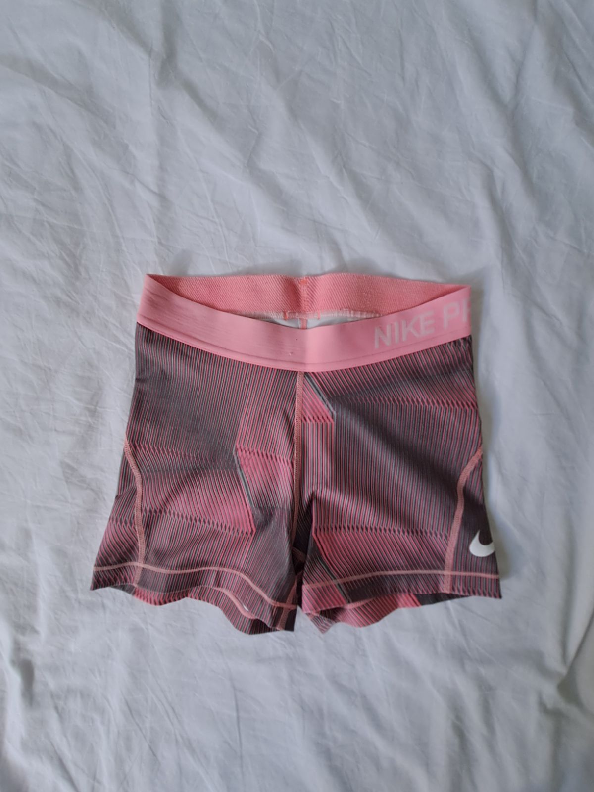 grey and pink nike pro shorts