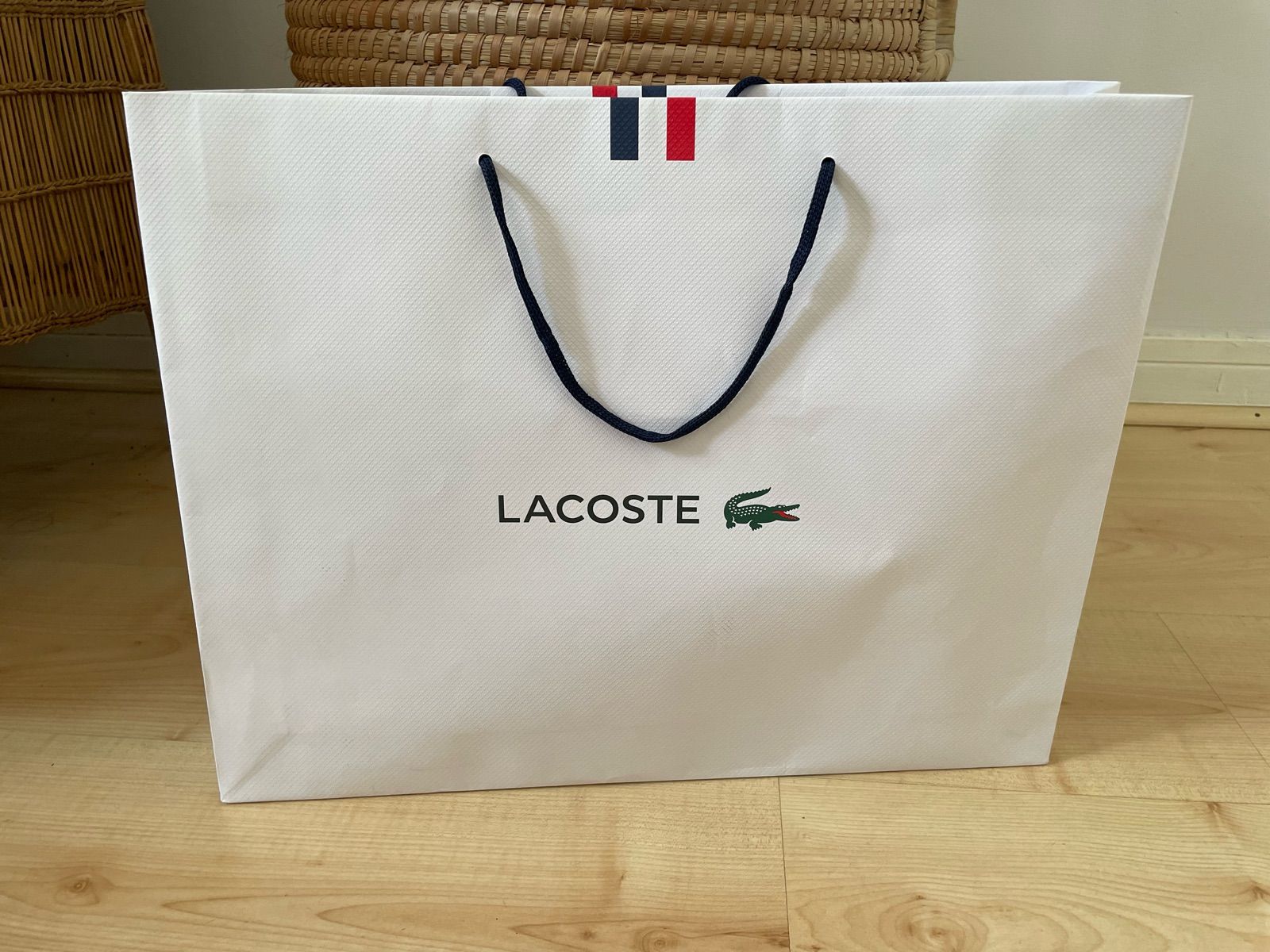 Lacoste paper discount bag for sale